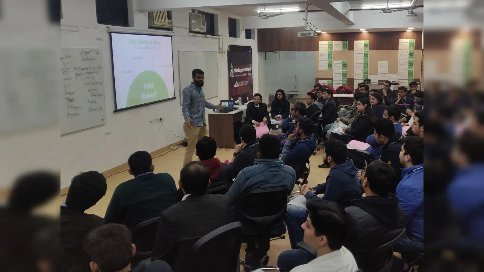 Entrepreneurship instructor speaking to a student audience